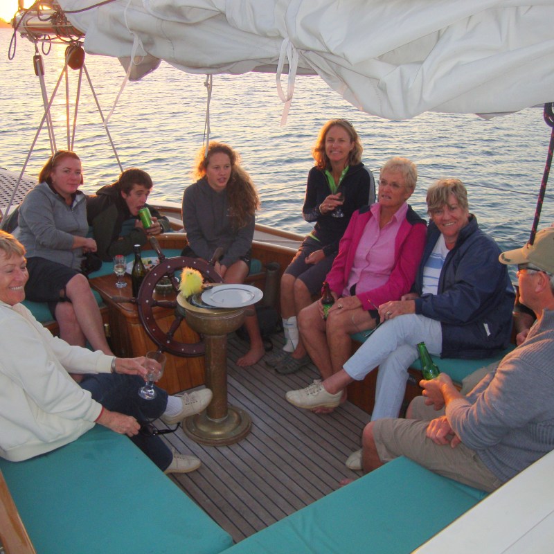 Group of people sailing during sunset in Auckland