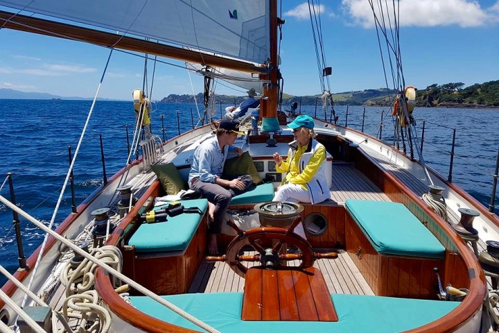 2 people on board on boat sailing to Waiheke Island