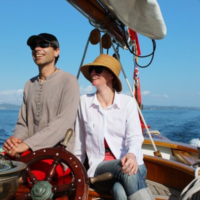 Couple sailing on a boat in Auckland
